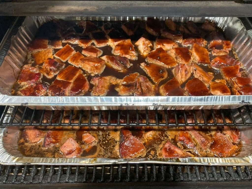 Pork cubes boiling in Smoker for 2hrs at 150C